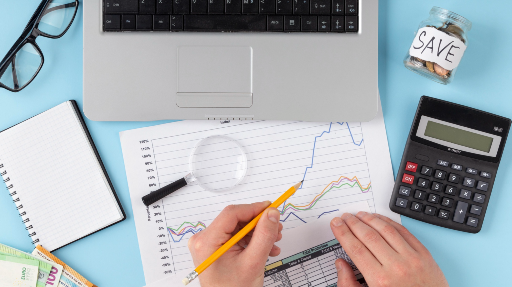 Salon owner reviewing financial performance and business growth charts.